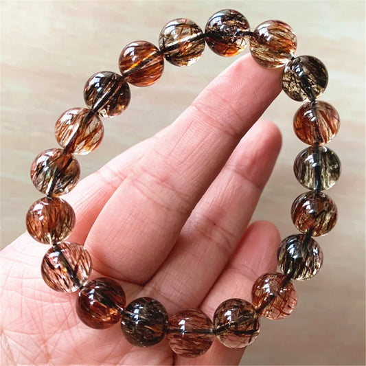 Featuring copper-infused crystals, this bracelet enhances grounding and protection, providing both aesthetic appeal and therapeutic benefits in a stunning, wearable piece.