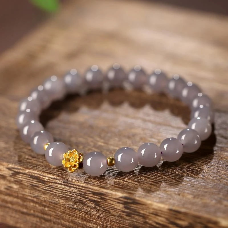 This elegant light gray crystal bracelet adds a subtle and refined touch to any look, perfect for those seeking understated sophistication.