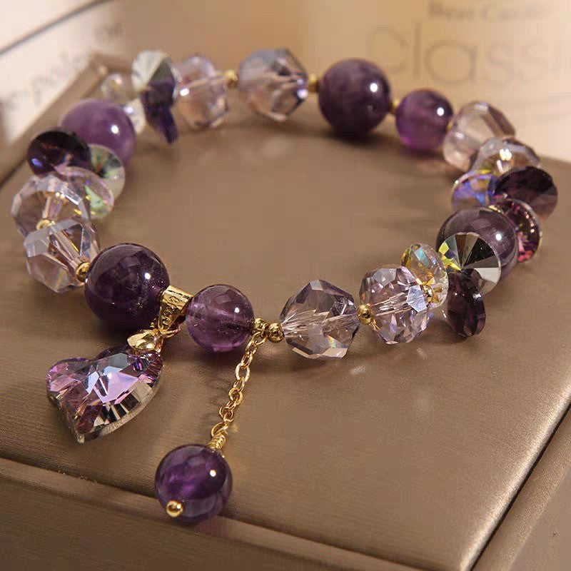 This elegant purple crystal bracelet adds a touch of refinement, perfect for those seeking a sophisticated yet vibrant accessory.