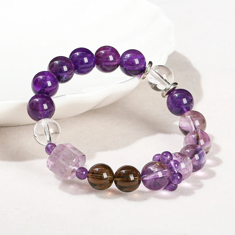 Enhance your style with this stunning purple crystal bracelet, perfect for adding a touch of elegance to any outfit. Made with high-quality gemstones for a chic and radiant look.