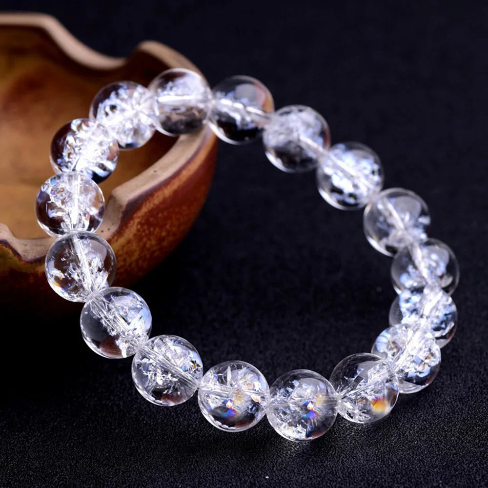 This elegant white crystal bracelet adds a touch of purity and sophistication, crafted with high-quality stones that complement any outfit with a clean, refined look.

