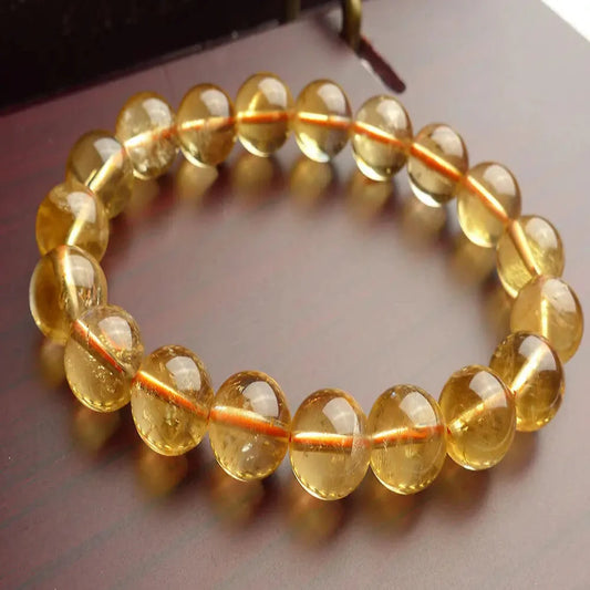 Embrace a radiant glow with this golden aura crystal bracelet, known for promoting vitality and inner strength, ideal for anyone who loves unique, energizing jewelry.