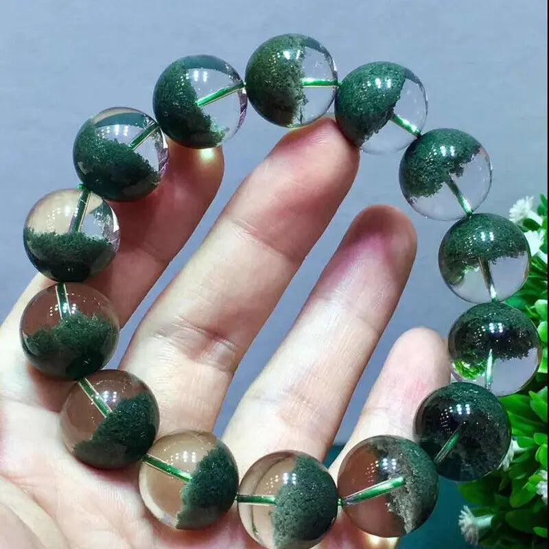  Known for its strong healing properties, this green phantom quartz bracelet is perfect for promoting personal growth, emotional healing, and grounding energy.