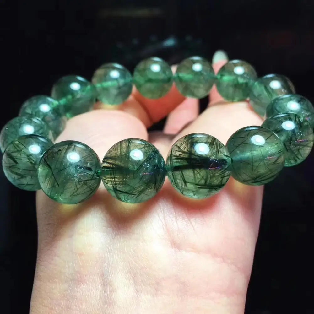 This natural green phantom crystal bracelet is crafted to enhance spiritual growth and transformation, offering a unique and powerful accessory for those seeking clarity and balance.