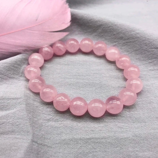  This pink crystal bracelet offers comfort and style, with delicate stones that add a subtle pop of color to any outfit.