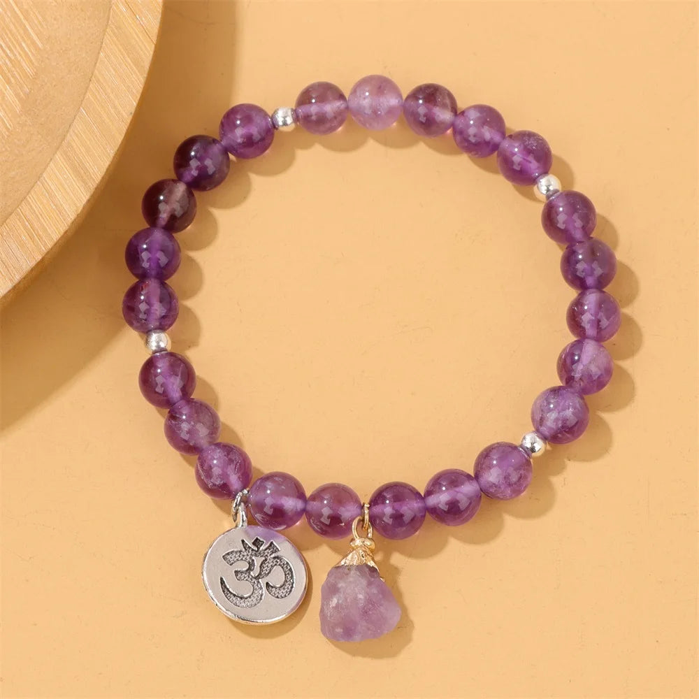 This bracelet is crafted with purple healing stones, promoting relaxation and tranquility, ideal for meditation or mindfulness practices.