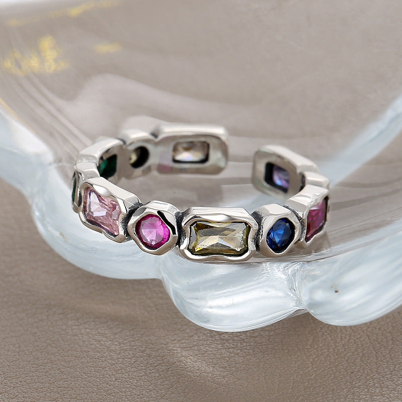 Crafted for versatility, this open silver ring with zirconia adds a subtle sparkle to any look